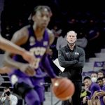 
              TCU head coach Jamie Dixon watches during the first half of an NCAA college basketball game against Kansas State Wednesday, Jan. 12, 2022, in Manhattan, Kan. (AP Photo/Charlie Riedel)
            