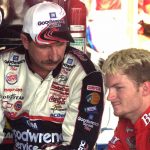 
              FILE - Dale Earnhardt and his son Dale Earnhardt Jr., right, both of Kannapolis, N.C., chat in the garage at Darlington Raceway, Friday Sept. 1, 2000, as they wait for qualifying to begin for Sunday's Southern 500 in Darlington, S.C. As he prepares to join his late father in the NASCAR Hall of Fame, Dale Earnhardt Jr. can't help but wonder what his Dad would make of the career he's built on and off the track. (AP Photo/Lou Krasky, File)
            