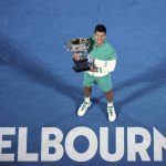 
              FILE - Serbia's Novak Djokovic holds the Norman Brookes Challenge Cup after defeating Russia's Daniil Medvedev in the men's singles final at the Australian Open tennis championship in Melbourne, Australia, Sunday, Feb. 21, 2021.Djokovic has had his visa canceled and been denied entry to Australia, Thursday, Jan. 6, 2022 and is set to be removed from the country after spending the night at the Melbourne airport as officials refused to let him enter the country for the Australian Open after an apparent visa mix-up.(AP Photo/Hamish Blair,File)
            