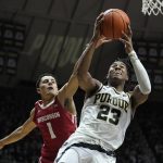 
              Purdue's Jaden Ivey (23) puts up a shot against Wisconsin's Johnny Davis (1) during the second half of an NCAA basketball game, Monday, Jan. 3, 2022, in West Lafayette, Ind. (AP Photo/Darron Cummings)
            