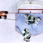 
              Dallas Stars goaltender Jake Oettinger is unable to make a save on a goal scored by Philadelphia Flyers' Ivan Provorov as Oskar Lindblom (23) and John Klingberg (3) close in on the crease during the second period of an NHL hockey game, Monday, Jan. 24, 2022, in Philadelphia. (AP Photo/Derik Hamilton)
            
