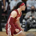 
              Washington State guard Tyrell Roberts reacts after hitting a three-point-basket against Colorado in the second half of an NCAA college basketball game Thursday, Jan. 6, 2022, in Boulder, Colo. (AP Photo/David Zalubowski)
            