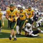 
              North Dakota State fullback Hunter Luepke (44) celebrates his touchdown against Montana State during the first half of the FCS Championship NCAA college football game in Frisco, Texas, Saturday, Jan. 8, 2022. (AP Photo/Michael Ainsworth)
            