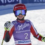 
              Austria's Ariane Raedler smiles at finish area after completing an alpine ski, women's World Cup super-G race in Zauchensee, Austria, Sunday, Jan. 16, 2022. (AP Photo/Marco Trovati)
            