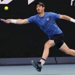 
              Andy Murray of Britain plays a forehand return to Taro Daniel of Japan during their second round match at the Australian Open tennis championships in Melbourne, Australia, Thursday, Jan. 20, 2022. (AP Photo/Simon Baker)
            
