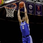 
              Kentucky forward Jacob Toppin (0) dunks against LSU in the first half of an NCAA college basketball game  in Baton Rouge, La., Tuesday, Jan. 4, 2022. (AP Photo/Derick Hingle)
            