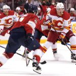 
              Calgary Flames left wing Matthew Tkachuk (19) skates with the puck during the second period of an NHL hockey game against the Florida Panthers, Tuesday, Jan. 4, 2022, in Sunrise, Fla. (AP Photo/Lynne Sladky)
            