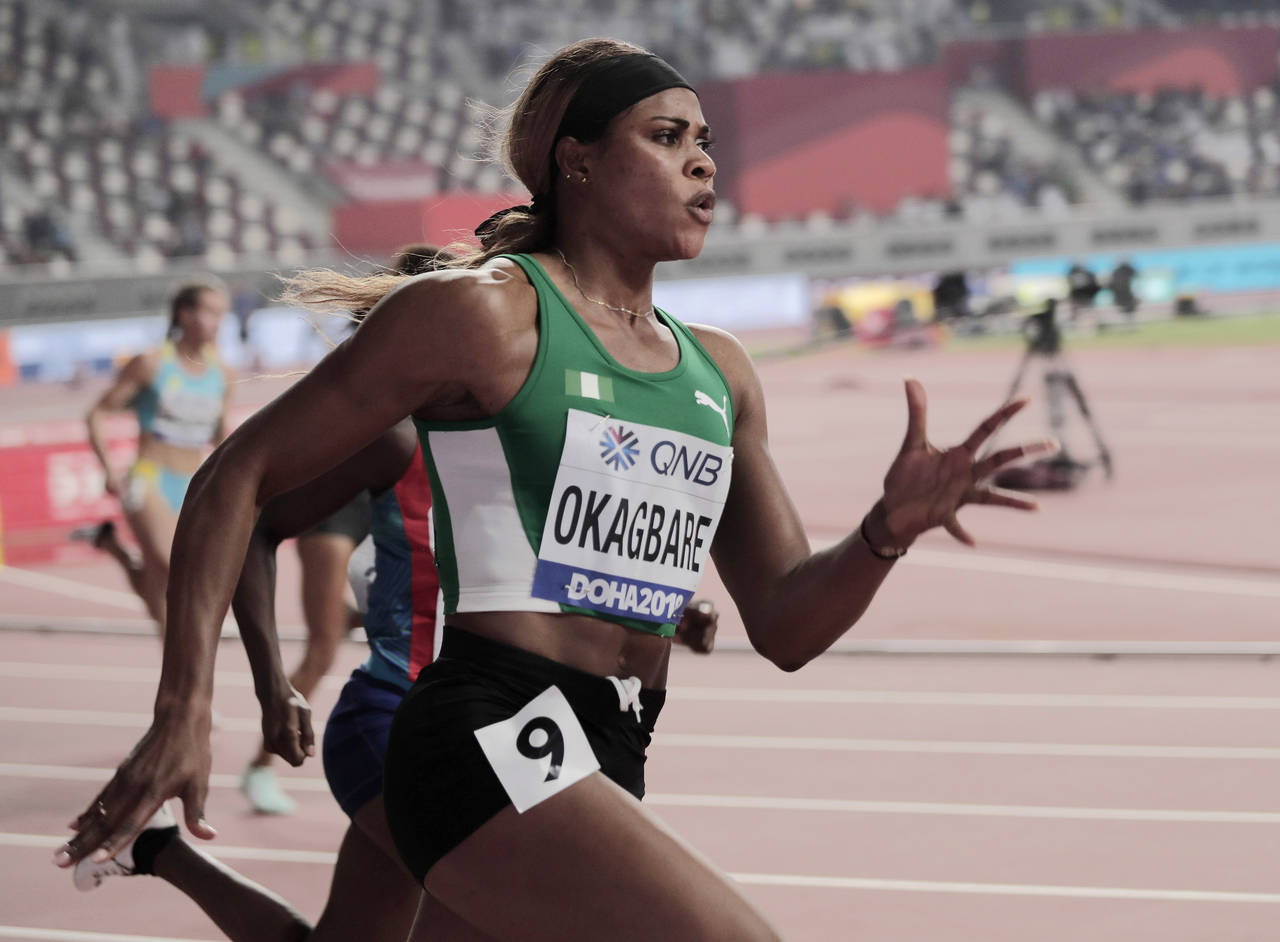 Blessing Okagbare, of Nigeria races in a women's 200 meter heat at the World Athletics Championship...
