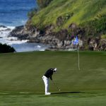 
              Sungjae Im, of South Korea, putts on the 12th green during the second round of the Tournament of Champions golf event, Friday, Jan. 7, 2022, at Kapalua Plantation Course in Kapalua, Hawaii. (AP Photo/Matt York)
            