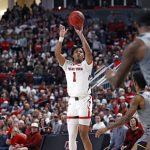 
              Texas Tech's Terrence Shannon Jr. (1) shoots the ball during the second half of an NCAA college basketball game against West Virginia, Saturday, Jan. 22, 2022, in Lubbock, Texas. (AP Photo/Brad Tollefson)
            