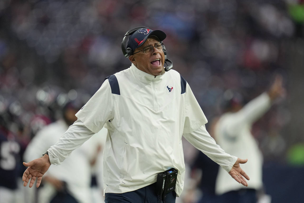 Houston Texans head coach David Culley questions a call during the first half of an NFL football ga...