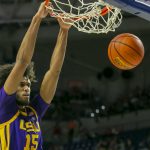 
              LSU center Efton Reid (15) dunks during the first half of an NCAA college basketball game against Florida, Wednesday, Jan. 12, 2022, in Gainesville, Fla. (AP Photo/Alan Youngblood)
            