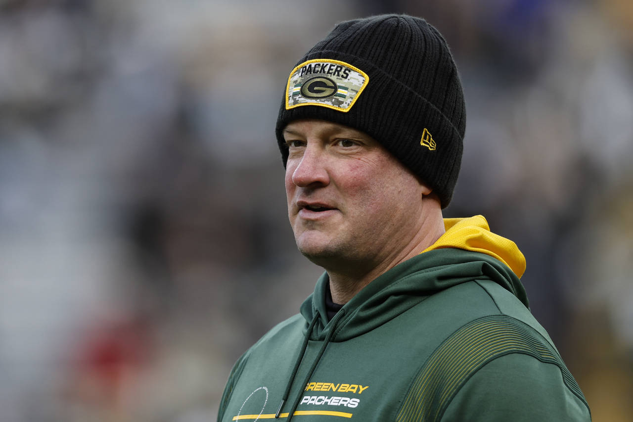 FILE - Green Bay Packers offensive coordinator Nathaniel Hackett looks on during pre-game warm-ups ...