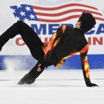 
              Nathan Chen falls in the men's free skate program during the U.S. Figure Skating Championships Sunday, Jan. 9, 2022, in Nashville, Tenn. (AP Photo/Mark Zaleski)
            