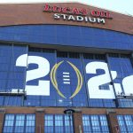
              Workers put the final touches on Lucas Oil Stadium ahead of the NCAA college football national championship game between Alabama and Georgia on Friday, Jan. 7, 2022, in Indianapolis. (Curtis Compton/Atlanta Journal-Constitution via AP)
            