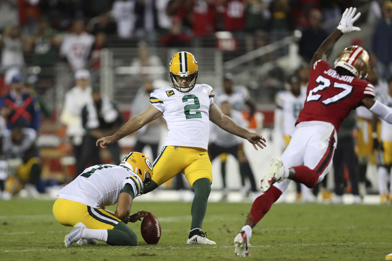 FILE -Green Bay Packers kicker Mason Crosby (2) kicks the game winning field goal from the hold of ...