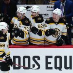 
              Boston Bruins left wing Erik Haula (56) celebrates his goal against the Arizona Coyotes with Bruins' Craig Smith (12), Patrice Bergeron (37), Tomas Nosek (92) Curtis Lazar (20) and Brad Marchand (63) during the first period of an NHL hockey game Friday, Jan. 28, 2022, in Glendale, Ariz. (AP Photo/Ross D. Franklin)
            