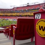 
              FILE - Seats at Fedex Field display the Washington Football Team logo during pregame warmups of an NFL football game between Washington Football Team and Philadelphia Eagles, in Landover, Md., Sunday, Sept. 13, 2020. Washington’s NFL team said Tuesday, Jan. 4, 2022, it will unveil its new name on Feb. 2. Team president Jason Wright confirmed that the name will not be Wolves or RedWolves. He cited trademark challenges for not going down that path that was popular among fans.(AP Photo/Susan Walsh, File)
            