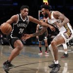 
              Brooklyn Nets guard Cam Thomas (24) drives to the basket to the basket against New Orleans Pelicans guard Nickeil Alexander-Walker (6) during the first half of an NBA basketball game, Saturday, Jan. 15, 2022, in New York. (AP Photo/Noah K. Murray)
            