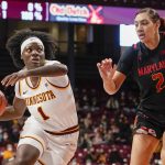 
              Minnesota guard Alexia Smith (1) drives past Maryland forward Mimi Collins (2) during the first half an NCAA college basketball game Sunday Jan. 9, 2022, in Minneapolis. (AP Photo/Craig Lassig)
            