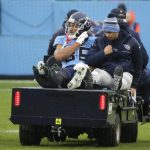 
              Tennessee Titans tight end MyCole Pruitt is taken off the field after being injured in the first half of an NFL football game against the Miami Dolphins Sunday, Jan. 2, 2022, in Nashville, Tenn. (AP Photo/James Kenney)
            
