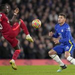 
              Liverpool's Sadio Mane, left, and Chelsea's Thiago Silva contest possession during the English Premier League soccer match between Chelsea and Liverpool at Stamford Bridge in London, Sunday, Jan. 2, 2022. (AP Photo/Matt Dunham)
            