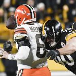 
              Pittsburgh Steelers outside linebacker T.J. Watt (90) sacks Cleveland Browns quarterback Baker Mayfield (6) in the second half of an NFL football game, Monday, Jan. 3, 2022, in Pittsburgh. (AP Photo/Don Wright)
            