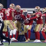 
              San Francisco 49ers' Jauan Jennings (15), George Kittle (85), Kyle Juszczyk (44), Brandon Aiyuk (11) and Jimmy Garoppolo, right, celebrate with Deebo Samuel (19) after his touchdown catch in the second half of an NFL wild-card playoff football game in Arlington, Texas, Sunday, Jan. 16, 2022. (AP Photo/Ron Jenkins)
            