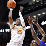
              Tennessee guard Jordan Horston (25) shoots over Kentucky forward Dre'una Edwards (44) during an NCAA college basketball game Sunday, Jan. 16, 2022, in Knoxville, Tenn. (AP Photo/Wade Payne)
            