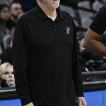 
              San Antonio Spurs head coach Gregg Popovich watches his players during the first half of an NBA basketball game against the Los Angeles Clippers, Saturday, Jan. 15, 2022, in San Antonio. (AP Photo/Darren Abate)
            