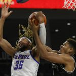 
              Providence's Ed Croswell (5) battles DePaul's Brandon Johnson (35) for a rebound during the first half of an NCAA college basketball game Saturday, Jan.1, 2022, in Chicago. (AP Photo/Paul Beaty)
            