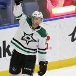 
              Dallas Stars left wing Jason Robertson (21) celebrates during the third period of an NHL hockey game against the Buffalo Sabres, Thursday, Jan. 20, 2022, in Buffalo, N.Y. (AP Photo/Jeffrey T. Barnes)
            