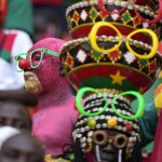 
              A vies of a Burkina Faso supporter before the start of the African Cup of Nations 2022 group A soccer match between Cameroon and Burkina Faso at the Olembe stadium in Yaounde, Cameroon, Sunday, Jan. 9, 2022. (AP Photo/Themba Hadebe)
            