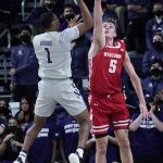 
              Wisconsin forward Tyler Wahl, right, guards Northwestern guard Chase Audige during the first half of an NCAA college basketball game in Evanston, Ill., Tuesday, Jan. 18, 2022. (AP Photo/Nam Y. Huh)
            