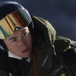 
              Italy's Sofia Goggia looks at the course before an alpine ski, women's World Cup super-G race in Cortina d'Ampezzo, Italy, Sunday, Jan. 23, 2022. (AP Photo/Gabriele Facciotti)
            