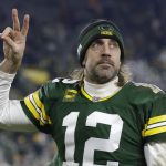 
              Green Bay Packers' Aaron Rodgers acknowledges the crowd after an NFL football game against the Minnesota Vikings Sunday, Jan. 2, 2022, in Green Bay, Wis. The Packers won 37-10. (AP Photo/Matt Ludtke)
            