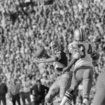 
              FILE - San Francisco 49ers quarterback John Brodie looks to pass as Dallas Cowboys' Cornell Green (34) defends  during the NFC championship game in San Francisco, Jan. 3, 1971. In the first meeting at Kezar Stadium in San Francisco, Dallas used 143 yards rushing and a TD from Duane Thomas and two interceptions of John Brodie to win 17-10. (AP Photo/File)
            