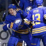 
              Buffalo Sabres left wing Jeff Skinner (53) celebrates his goal during the third period of an NHL hockey game against the Detroit Red Wings, Monday, Jan. 17, 2022, in Buffalo, N.Y. (AP Photo/Jeffrey T. Barnes)
            