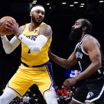 
              Brooklyn Nets' James Harden, right, defends Los Angeles Lakers' Carmelo Anthony, left, during the first half of an NBA basketball game Tuesday, Jan. 25, 2022 in New York. (AP Photo/Frank Franklin II)
            
