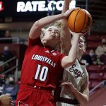 
              Louisville guard Hailey Van Lith (10) shoots ahead of Boston College guard Cameron Swartz (1) during the first half of an NCAA college basketball game, Sunday, Jan. 16, 2022, in Boston. (AP Photo/Mary Schwalm)
            