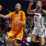 
              Tennessee guard Jordan Horston (25) attempts a layup as Mississippi forward Shakira Austin (0) defends during the first half of an NCAA college basketball game in Oxford, Miss., Sunday, Jan. 9, 2022. (AP Photo/Rogelio V. Solis)
            