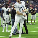 
              Tennessee Titans quarterback Ryan Tannehill (17) celebrates with fans after their win over the Houston Texans in an NFL football game, Sunday, Jan. 9, 2022, in Houston. (AP Photo/Justin Rex )
            