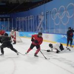 
              Members of the Canada women's hockey team practice at the 2022 Winter Olympics, Sunday, Jan. 30, 2022, in Beijing. (AP Photo/Jeff Roberson)
            