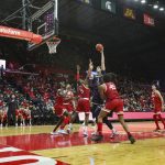 
              Michigan center Hunter Dickinson (1) shoots over Rutgers forward Aundre Hyatt (5) during the first half of an NCAA college basketball game Tuesday, Jan. 4, 2022, in Piscataway, N.J. (Andrew Mills/NJ Advance Media via AP)
            