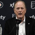 
              Philadelphia Flyers chairman Dave Scott speaks during a news conference at the team's NHL hockey practice facility, Wednesday, Jan. 26, 2022, in Voorhees, N.J. The Flyers have lost a team-record 13 straight games. (AP Photo/Matt Rourke)
            