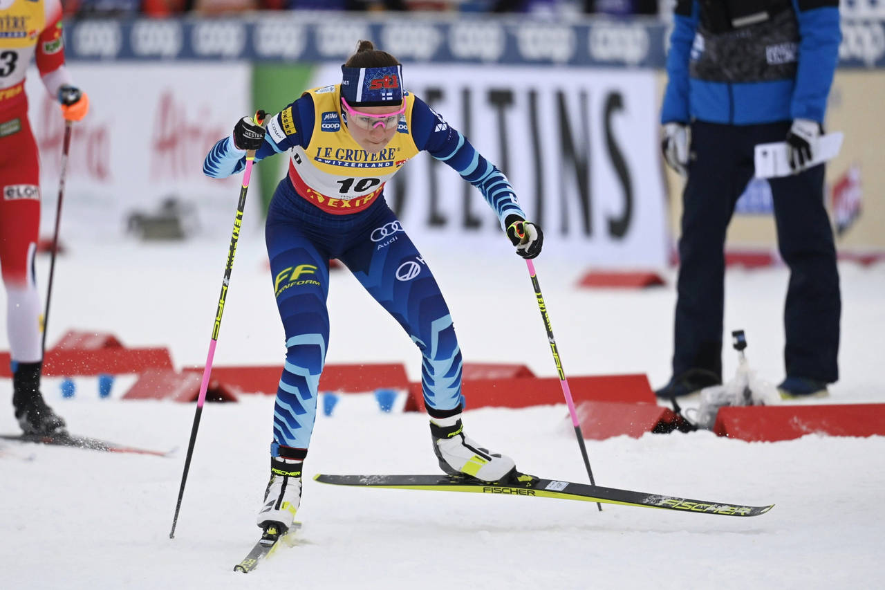FILE - Norway's Anne Kjersti Kalvaa competes during a women's cross country skiing freestyle 10 km ...