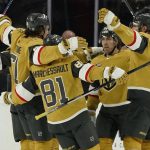
              Vegas Golden Knights celebrate after Vegas Golden Knights defenseman Alex Pietrangelo, right, scored against the Toronto Maple Leafs during the third period of an NHL hockey game Tuesday, Jan. 11, 2022, in Las Vegas. (AP Photo/John Locher)
            