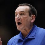 
              Duke coach Mike Krzyzewski directs the team during the second half of an NCAA college basketball game against Miami in Durham, N.C., Saturday, Jan. 8, 2022. (AP Photo/Gerry Broome)
            