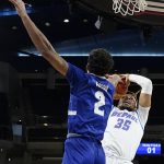 
              Seton Hall's Tray Jackson (2) pressures the shot of DePaul's Brandon Johnson during the first half of an NCAA college basketball game Thursday, Jan. 13, 2022, in Chicago. (AP Photo/Charles Rex Arbogast)
            