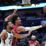 
              New Orleans Pelicans center Jaxson Hayes battles under the basket with Utah Jazz center Rudy Gobert (27) in the first half of an NBA basketball game in New Orleans, Monday, Jan. 3, 2022. (AP Photo/Gerald Herbert)
            